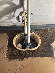 During: Our Foreman, Juan, and his crew installed WaterGuard and replaced the old sump pump system.
