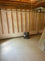 CleanSpace Wall Panels were installed to create a durable, moisture-resistant barrier that prevents water vapor from passing through basement walls while giving the space a clean, finished appearance. Paired with our SaniDry Sedona Dehumidifier, this system actively removes excess moisture from the air, reducing humidity, preventing mold growth, and improving overall air quality for a healthier, more comfortable basement environment.