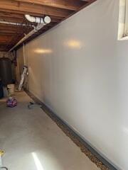 During: Our Foreman, Gabriel, and his crew secured the waterproofing products in the home.