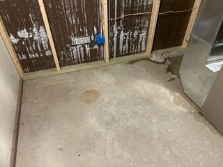 Before: Our Design Specialist, Chuck, recommended installing the TripleSafe to prevent further water issues.