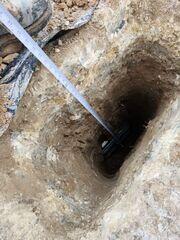 During: Our Foreman, Lane, and his crew secured three GeoLock Wall Anchors along the struggling wall.