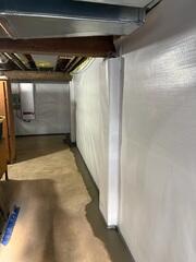 To protect the basement walls from moisture and improve the overall environment, our crew installed CleanSpace Wall Panels.