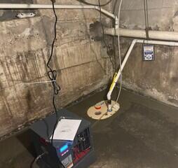 The SaniDry Sedona dehumidifier controls the humidity in the air year-round and drains itself into the SuperSump Plus sump pump. The SuperSump Plus sends the collected water out of the home through the discharge line.