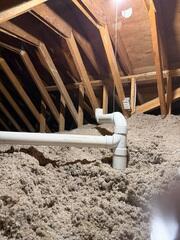 During: Our Foreman, Gustavo, and his crew worked hard to secure the system inside their attic.