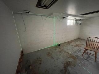 Before: Our Design Specialist, Ryan, recommended securing GeoLock Wall Anchors on the weakening walls.