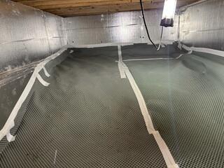 Drainage Matting was installed to manage surface moisture while improving insulation performance, allowing water to flow freely to the drainage system while SilverGlo resists moisture, reflects heat, and helps maintain a dry, energy-efficient crawl space.