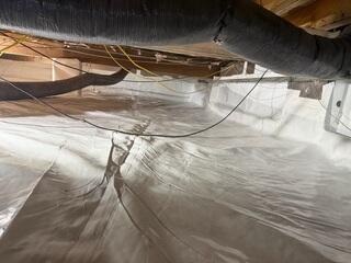 Our CleanSpace Vapor Barrier System acts as a strong, sealed barrier between the crawl space and the earth, preventing ground moisture and humidity from entering the space.