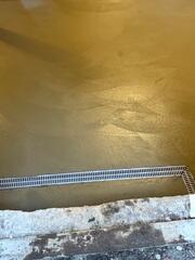 The Trechdrain system will collect any water sneaking into the basement via the doorway entrance.