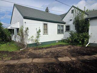 Before: Our Design Specialist, Greg, recommended securing a Radon Mitigation System.