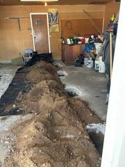 During: Our Foreman, Jose, and his crew secured four GeoLock Wall Anchors on the damaged foundation walls.