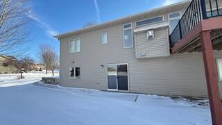 Before: Our Design Specialist, Nate, recommended securing a Radon Mitigation System outside the home.