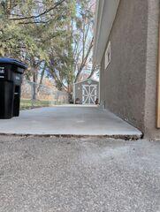 During: Our crew successfully lifted the sidewalk back into place.