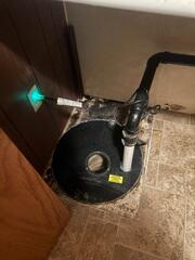 During: Our Radon Sales + Service Technician, Jackson, succesfully secured the Radon Mitigation System in the home.