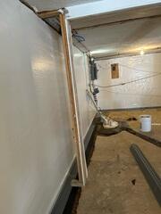 During: Our Foreman, Kiko, and his crew secured the waterproofing products throughout the basement.