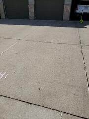 During: Our Foreman and his crew secured the PolyLevel below the sinking driveway.