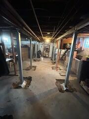 During: Our Foreman, Kevin, and his crew secured all the SmartJacks along the supplemental beam.