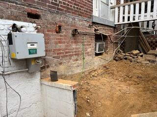 Foundation problems are apparent with brick on foundation showing signs of settlement over many years