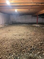 Before: Our Design Specialist, Dustin, recommended encapsulating the entire crawl space.