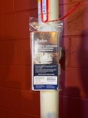 During: Our Foreman, Dakota, and his crew secured the Radon Mitigation System inside and outside the home.