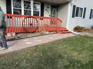 During: Our Foreman, Patrick, and his crew successfully installed PolyLevel below the sinking walkway and driveway.