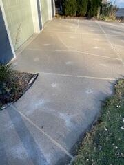 During: Our Foreman, Jordan, and his crew secured the products along the walkway and driveway.