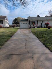 Before: Our Design Specialist, Nathan, recommended repairing the concrete.