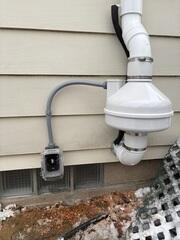 During: Our Foreman, Dakota, and his crew successfully secured the Radon Mitigation System.
