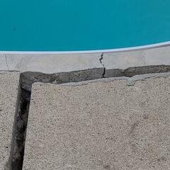 A 2-inch drop at the pool's edge is a major trip hazard. We restored this Oro-Medonte deck using precision polyurethane injection to close the gap and ensure a safe, level surface for the swim season.