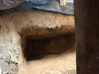 This photo shows one hole of many that we had to dig for the base of our SmartJacks. All though it may look like a regular four foot hole, the size was designed by engineers to ensure our SmartJacks distribute the weight of the home evenly across the floor of the crawl space. This is called the "bulb of influence."