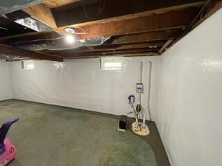 WaterGuard drainage system and TripleSafe sump pump now capture and remove groundwater before it can enter the basement.