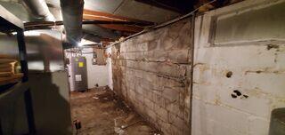 Before: Our Design Specialist, Chuck, recommended securing SmartJacks to prevent the foundation damage from continuing.