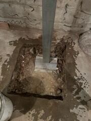 During: Our Foreman, Kiko, and his crew secured the SmartJacks around the struggling basement.