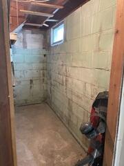 Before: Our Design Specialist, Chuck, recommended securing several waterproofing products throughout the basement.