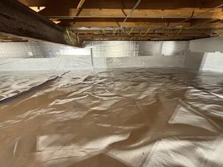 Crawl Space is encapsulation wtih Clean Space Vapor Barrier on top of the drainage matting and Silver glo.This provides additional insulation to help save on heating costs and cold floors.