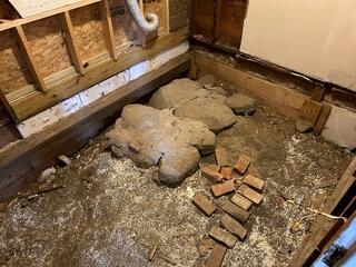 Before: Our Design Specialist, Dylan, noted the areas were suffering from settlement and recommended installing Helical Piers.