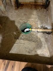 Before: Our Design Specialist, Ian, suggested securing several waterproofing products throughout the basement.