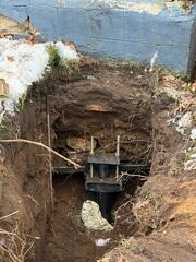 During: Gabriel, our Foreman, and his crew worked hard to secure the Helical Piers.