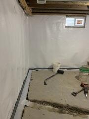 During: Our Foreman, Roel, and his crew recommended securing waterproofing products throughout the basement.