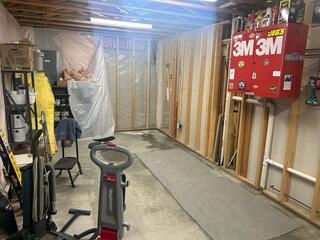 Before: Jason, one of our Design Specialists, recommended securing waterproofing products along the water-damaged wall.