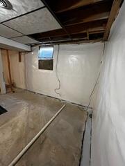 During: Our Foreman, Aaron, and his crew worked hard to secure all the products throughout the basement.