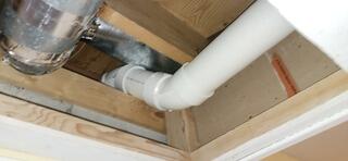 This is the small ceiling cut-out above the window that provided access to the chase.