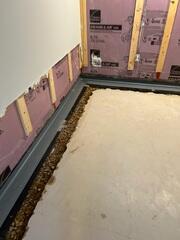 During: Our Foreman, Kevin, and his crew recommended installing several waterproofing products throughout the basement.