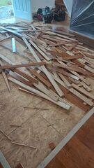 The crew took care to save as much of the flooring as possible to be replaced once the encapsulation was completed.