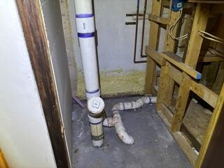 Before:  Our Design Specialist, Daniel, recommended securing waterproofing products throughout the basement.