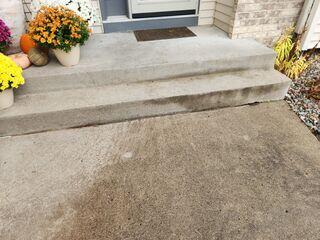 Before: Our Design Specialist, Dave, recommended lifting the walkway back to match the front steps.