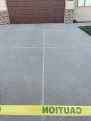 During: Our Foreman, Charlie, and his crew successfully lifted and leveled the concrete back to its original level.