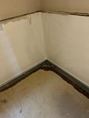 During: Our Foreman, Kevin, and his crew worked hard to secure the waterproofing products in the basement.