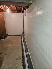 During: Our Foreman, Juan, and his crew succesfully secured the waterproofing products throughout the basement.