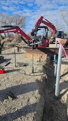 Load test setup and bracket assembly used to confirm pier capacity. Each installed pier was verified to meet design loads before structural integration.
