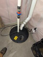 During: Our Foreman, Dakota, and his crew traveled to the home to secure the Radon Mitigation System.